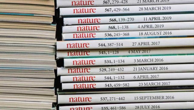 stack of nature journal issues